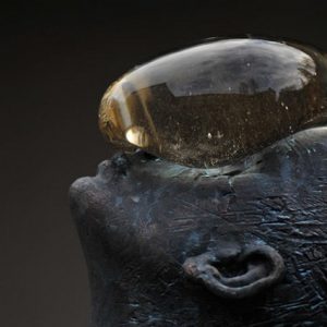 A Giant Glass Raindrop Balances on a Bronze Man’s Face in Ukraine - @This is Colossal A Giant Glass Raindrop