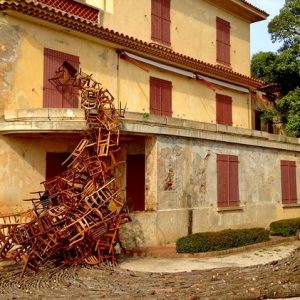 Masses of Wooden Chairs Pour From Old Villas by Karin van der Molen0 (0)